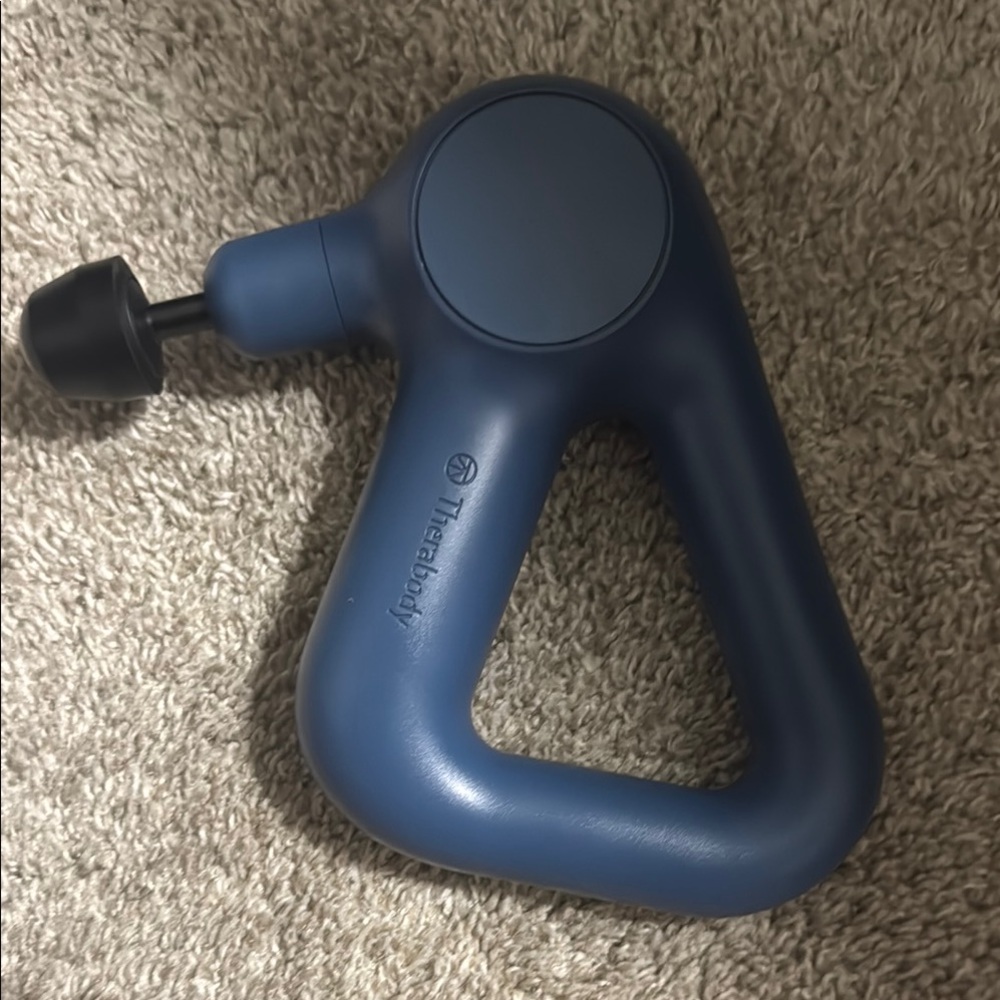 Therabody Blue Massage Gun with additional attachment